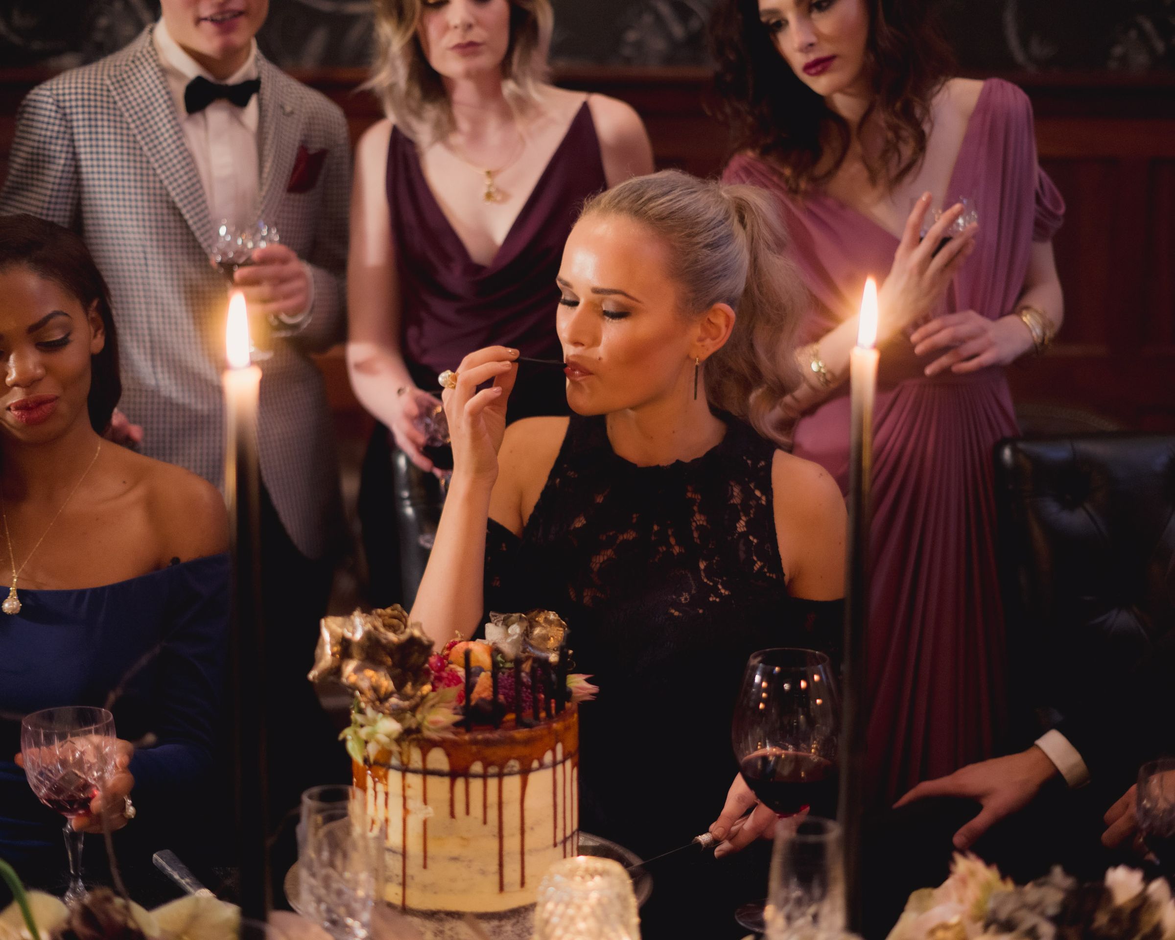An intimate celebration among elegant guests in a private club